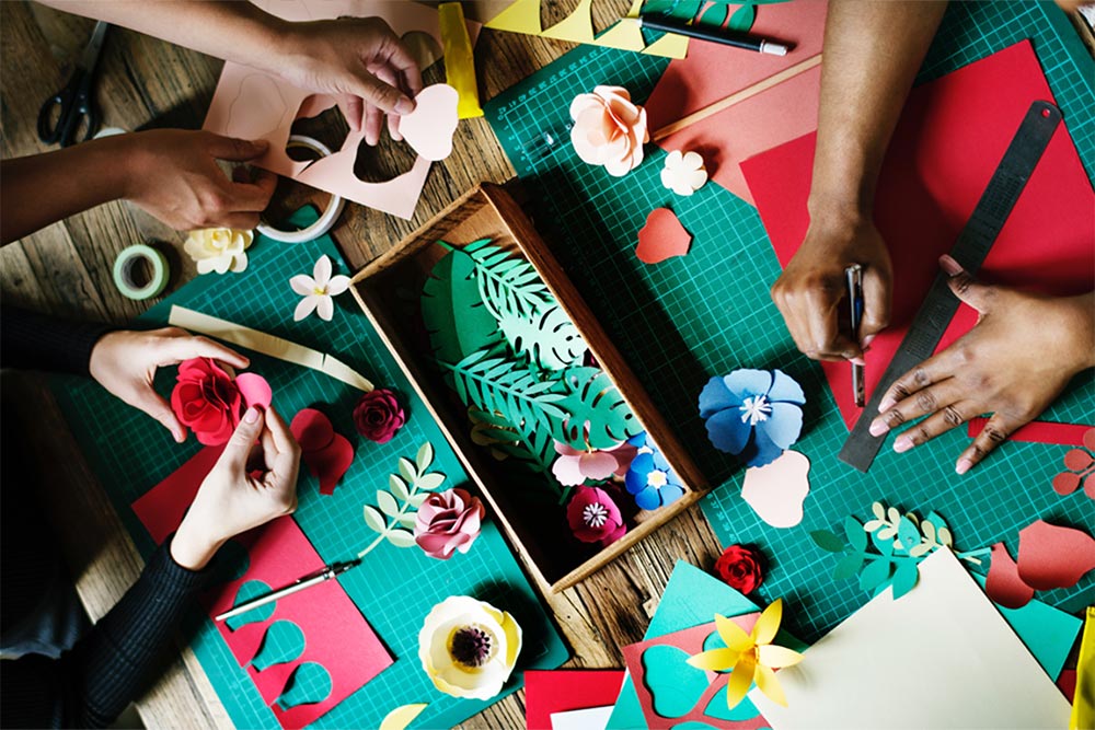 Image of hands crafting with paper