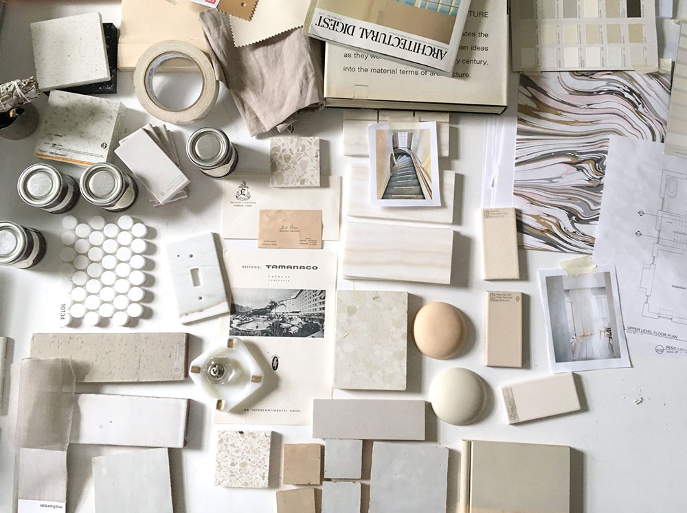 Image of decorating and painting supplies and samples in creams and whites
