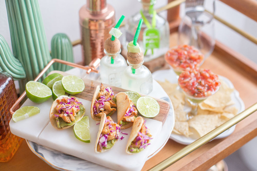 Image of party platter of tacos and tequilla